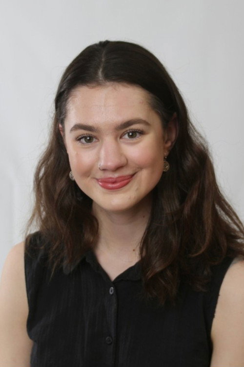 Meg Tisdall as Older Sister (Sophie)