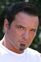 Micky Ray as Guard / Patron