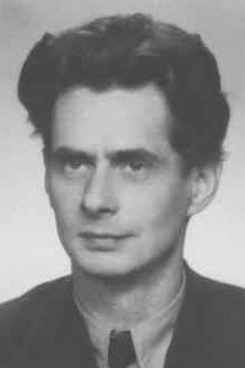 Adam Krajewicz as hydraulik Traszka, przyjaciel docenta