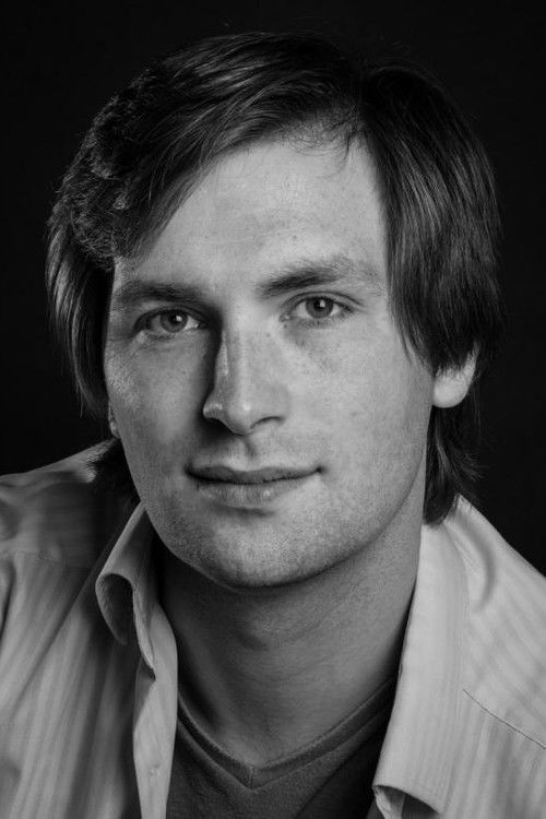 Rhys Lawton as Bookseller