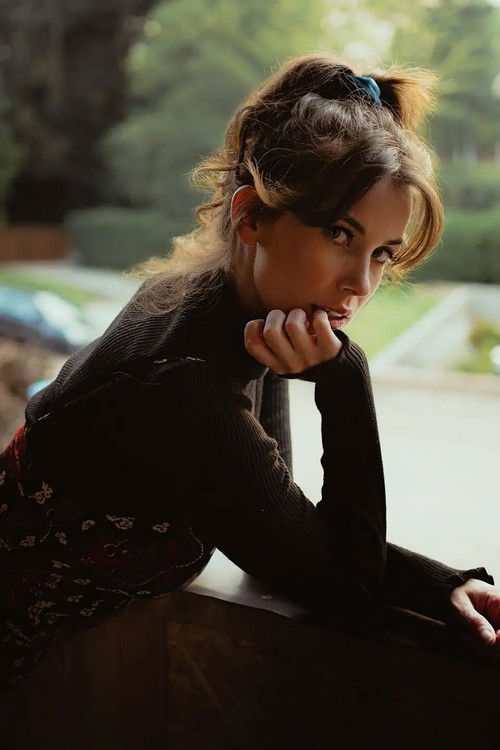 Claudia Burns as The Lady in Red