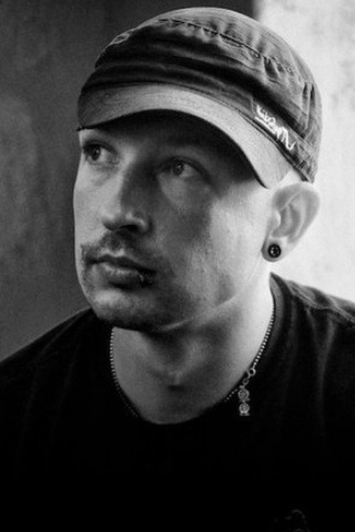 Maksim Podolski as Guard