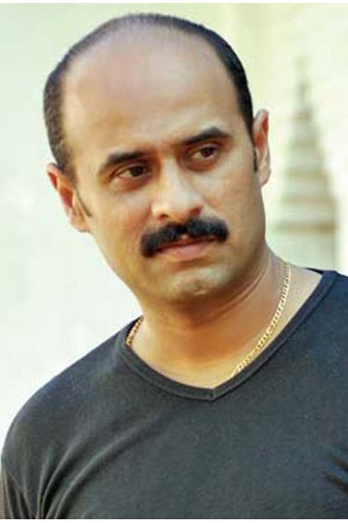 Rajesh Hebbar as Dr. Basheer