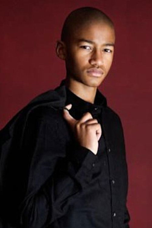 Dodi Mbemba as Miguel