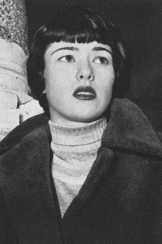 Mitzi Roman as Laura