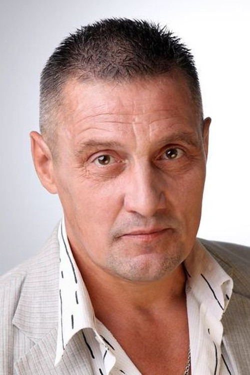 Andrey Balyakin as Hockey Coach