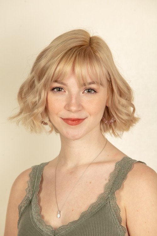 Caroline Travers as Waitress