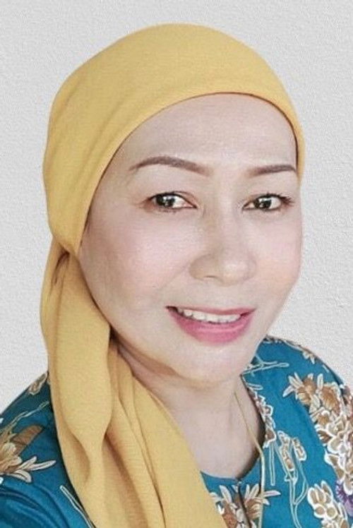 Nisha Mansor as Kak Milah