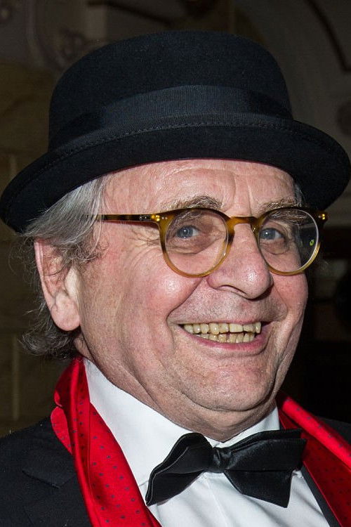 Sylvester McCoy as 