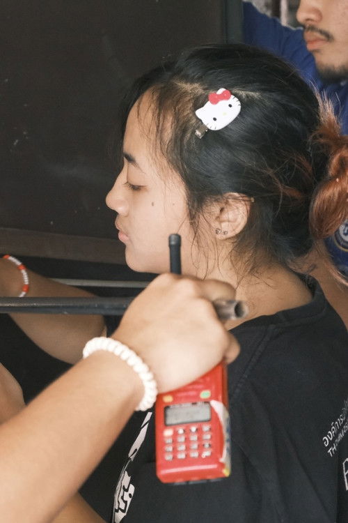 Supawee Kittikalyawong as Rin's Co-Worker, Student 2 (Voice)