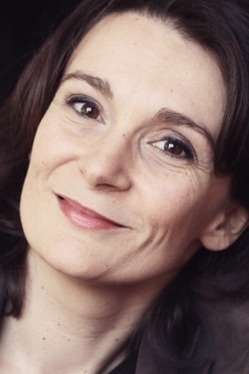 Axelle Bossard as Grocer