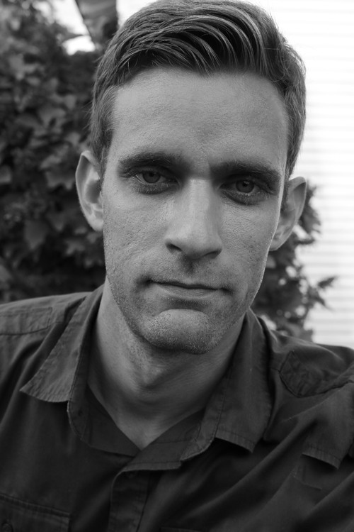 Sam Hanover as Man In Robe