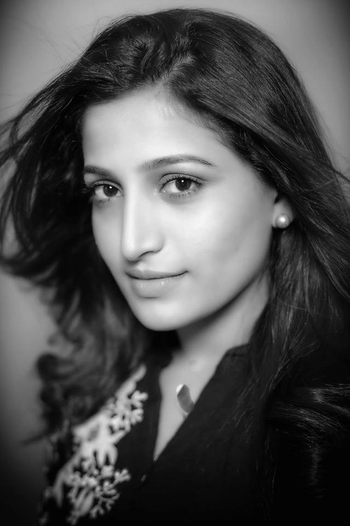 Santhoshi as Poornima