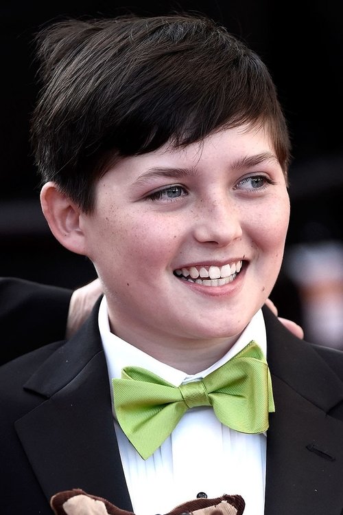 Riley Osborne as The Suitcase Boy