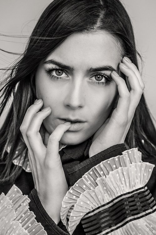 Carla McGlynn as Political activist