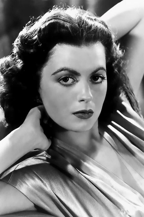 Faith Domergue as Dr. Marsha Evans, Vega