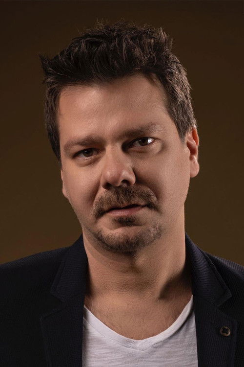 Alp Korkmaz as Ali Akdoğan