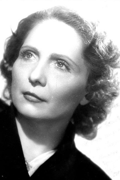 Mona Dol as Mathilde, midwife