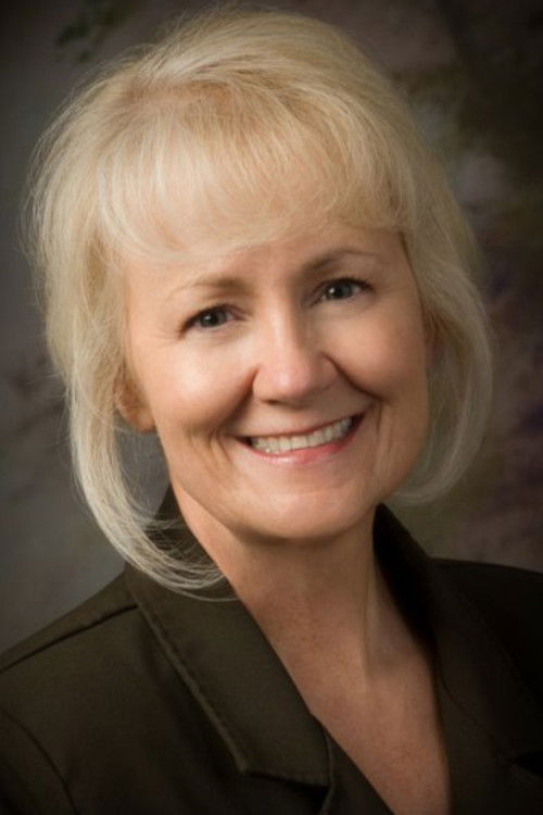 Kay Hand as Homeless/ Lobby Woman