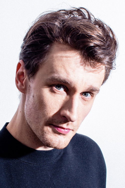 Adrian Brząkała as prison guard