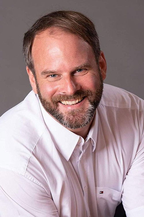 Stephan Buschmann as Party guest