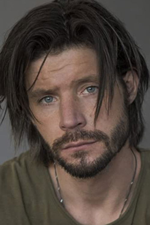 Justin Schwan as Logan