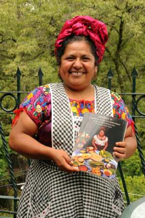 Abigail Mendoza as Women preparing the mole