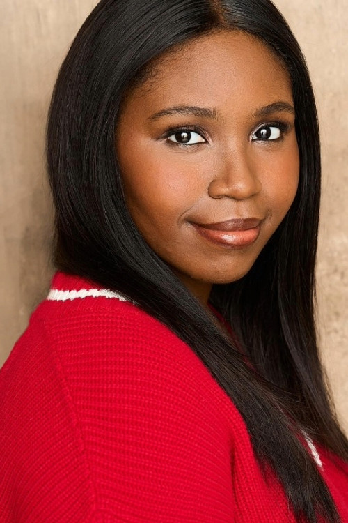 Yinka Olubiyi as Art Gallery Visitor 2