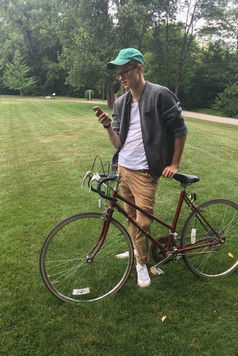 Logan Lloyd as The Newspaper Boy