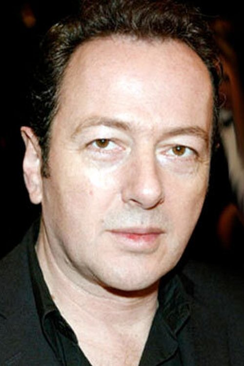Joe Strummer as Simms
