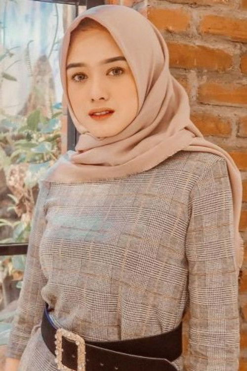 Arida Nuraini as Kikan