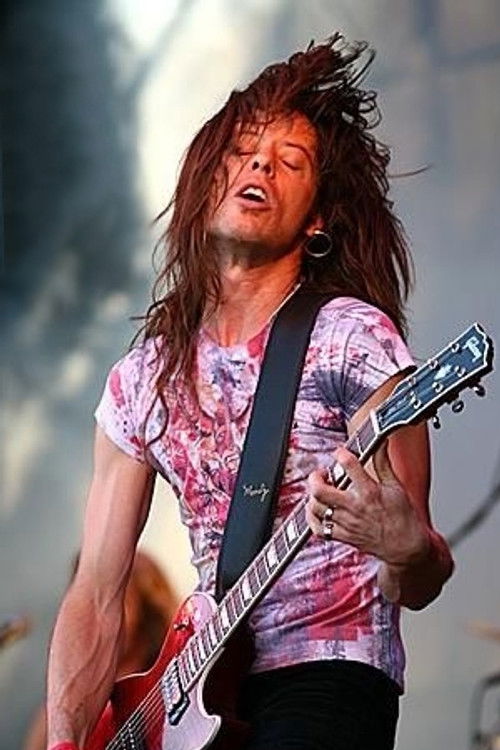 Jamie Law as Guitars