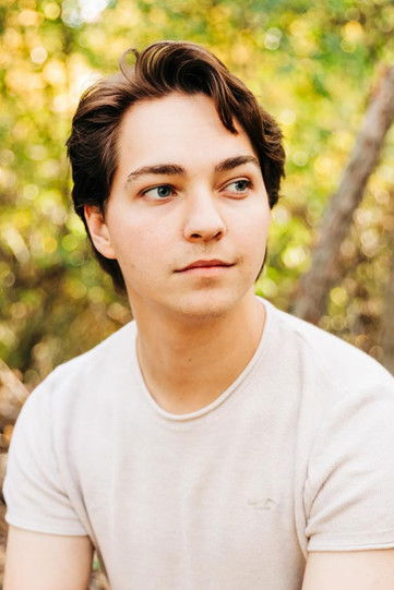 Alec Michael as Earpiece (voice)