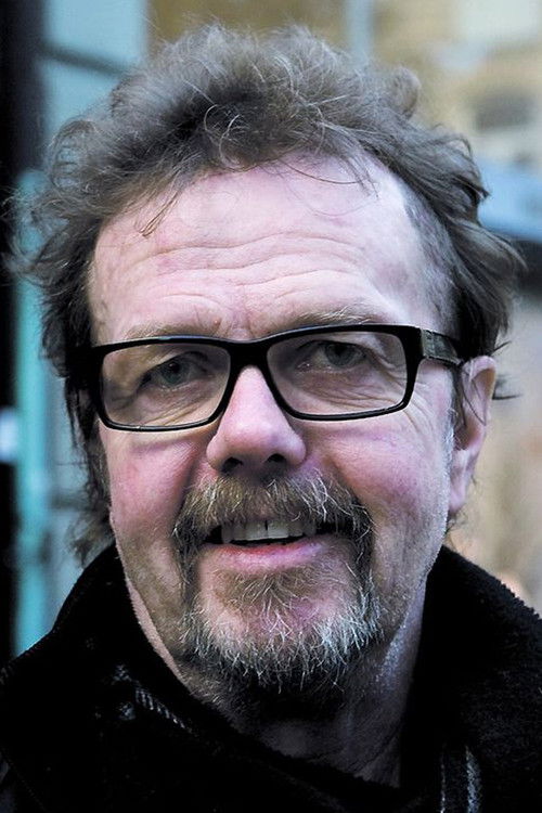 Göran Stangertz as Nils Strindberg