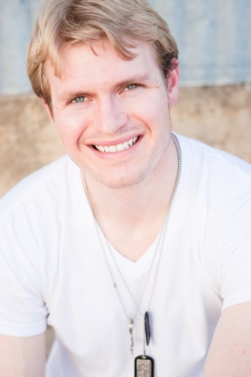 Justin Arnold as Travis