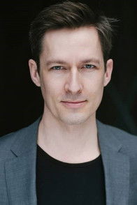 Luke Mullins as Adam