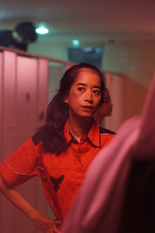 Dinar Roos as Mother of the Costumer