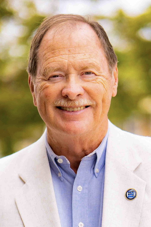 Dennis Erdman as Michael E. Mullen