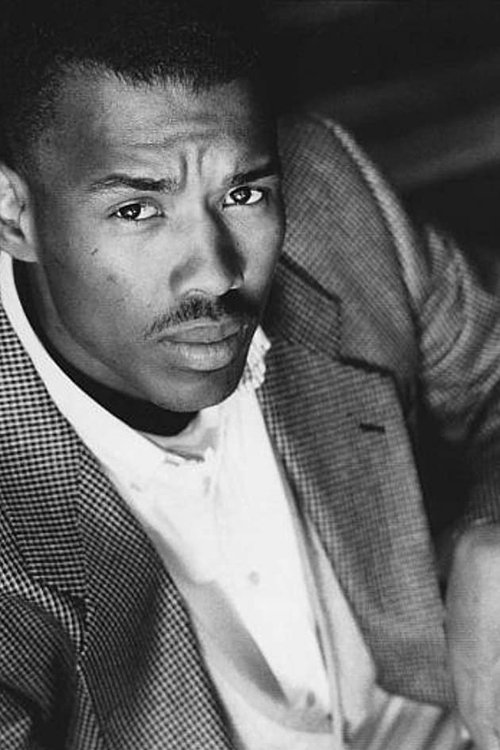 Marcus Lyle Brown as Father Enladade