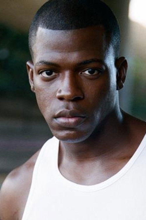 Cedric Sanders as Simon