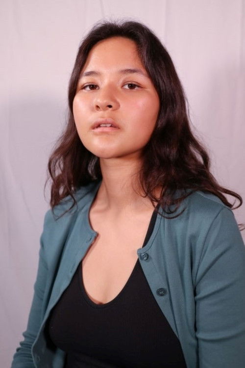 Celeste Liu as Anna (Cashier)