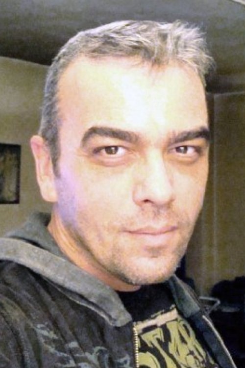 Mircea Caraman as John