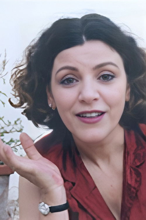 Fatima Loukili as Woman