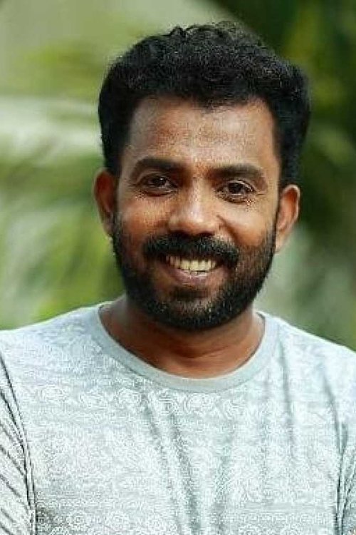 Azees Nedumangad as Jose Skaria