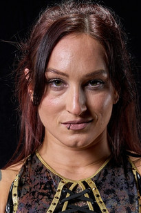 Kristen Stadtlander as Kris Statlander