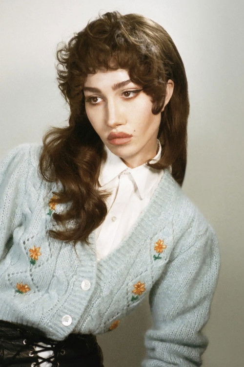 Nadia Lee Cohen as April