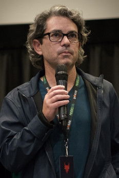 Evan Marlowe as Abe / Radio Annoncer