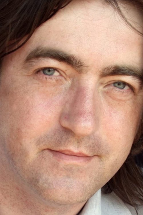 Steven Sheil as Fancy Dress Shop Owner