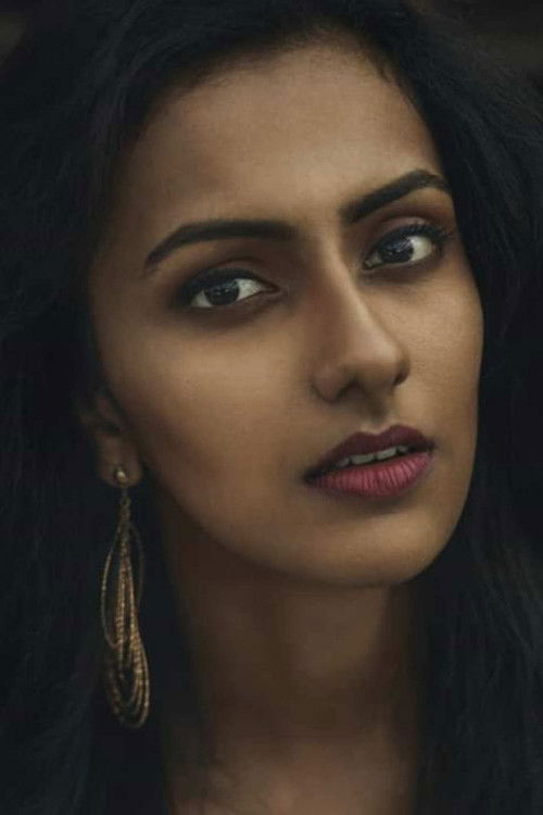 Archana Tommy as Girl with camera