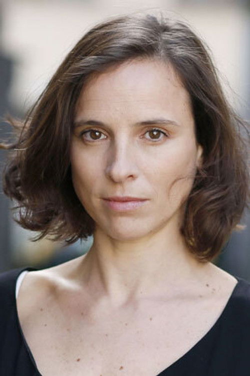 Géraldine Masquelier as Journalist